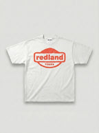 T-shirt bianca con logo rosso Redland Tours effetto timbro.