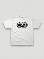 T-shirt bianca Redland Tours con logo ovale nero sul fronte.