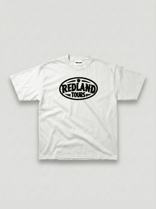 T-shirt bianca Redland Tours con logo ovale nero sul fronte.