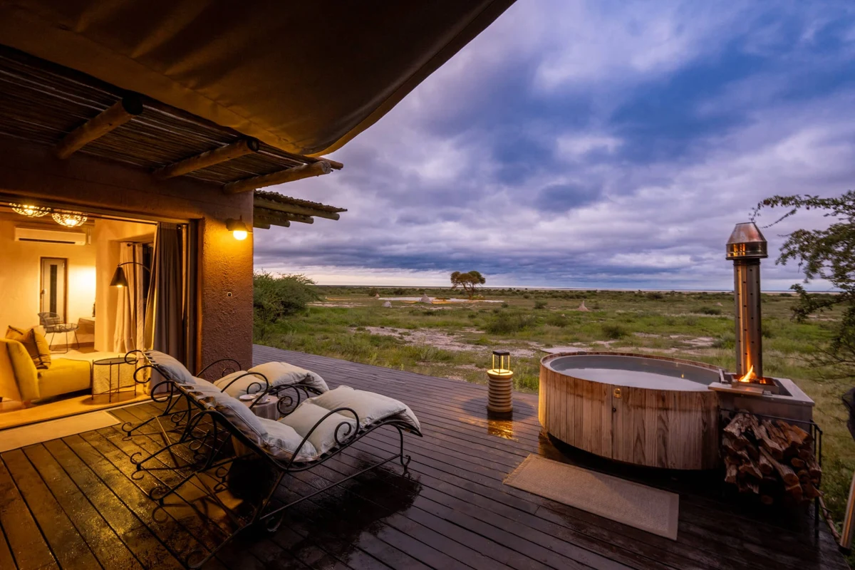 The terrace of a suite in Onguma The Fort, at dusk